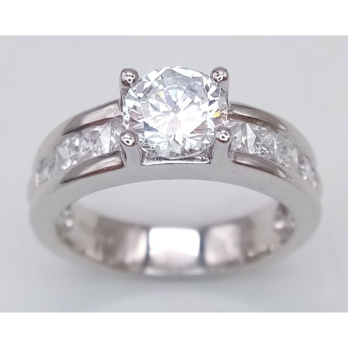 695 - A 9K WHITE GOLD RING WITH LARGE LAB GROWN DIAMOND CENTRE STONE PLUS DIAMOND SHOULDERSS .  5.1gms   s... 