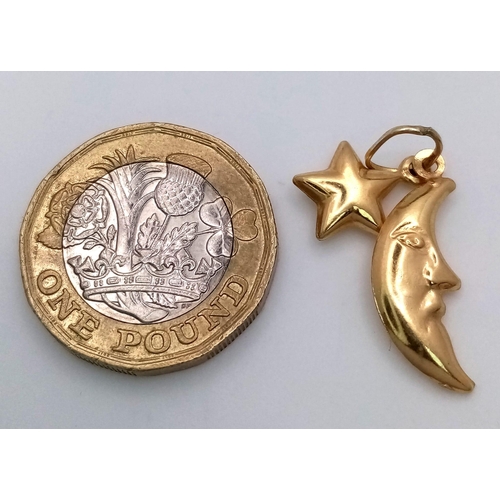 1084 - A 9K YELLOW GOLD STAR & MOON CHARM. TOTAL WEIGHT 0.8G