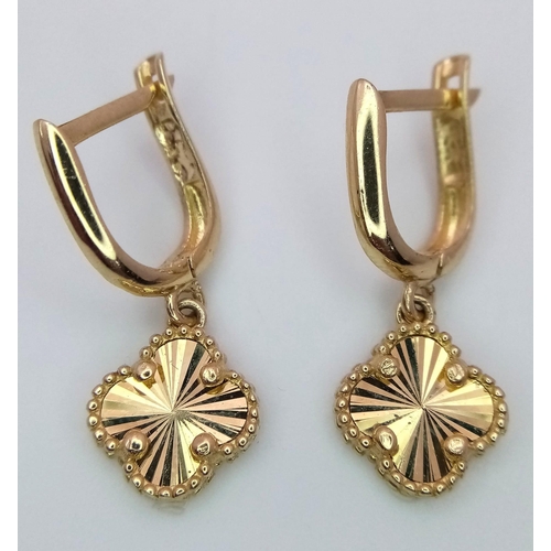 1112 - A PAIR OF 14K YELLOW GOLD CLOVER DROP EARRINGS. TOTAL WEIGHT 2.8G