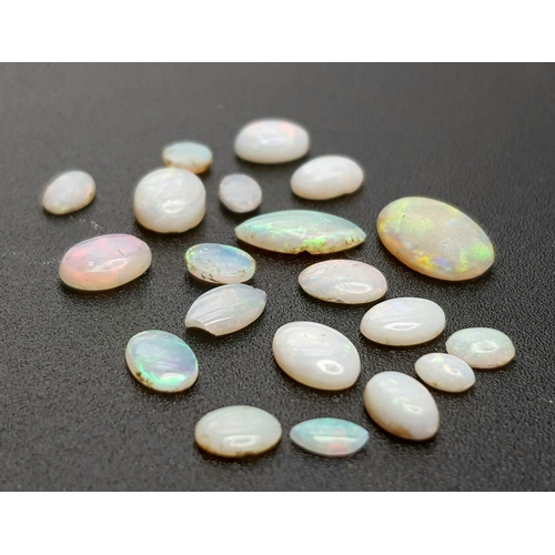 1115 - A Parcel of 20 Opals. Assorted Sizes up to 1cm, Oval Cuts, 6.25 Carats.