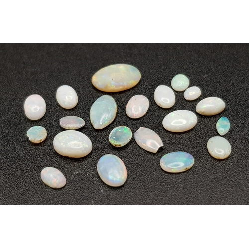 1115 - A Parcel of 20 Opals. Assorted Sizes up to 1cm, Oval Cuts, 6.25 Carats.