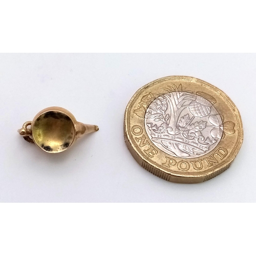 578 - A 9K YELLOW GOLD TEAPOT CHARM. TOTAL WEIGHT 1G