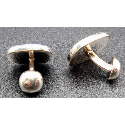 619 - A Pair of Classic 9K White Gold Lapis Lazuli Cufflinks. 18.46g total weight. Ref: 016075