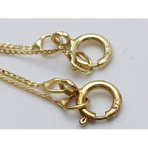 908 - Two 9K Yellow Gold Disappearing Necklaces with White Stone Pendants. 40cm necklace lengths. 1.45g to... 