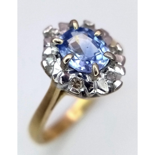 1383 - An 18K Yellow Gold Sapphire and Diamond Cluster Ring. Size K. 3.75g total weight.