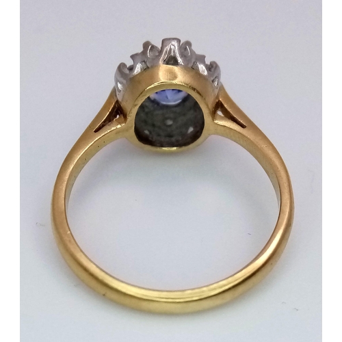 1383 - An 18K Yellow Gold Sapphire and Diamond Cluster Ring. Size K. 3.75g total weight.