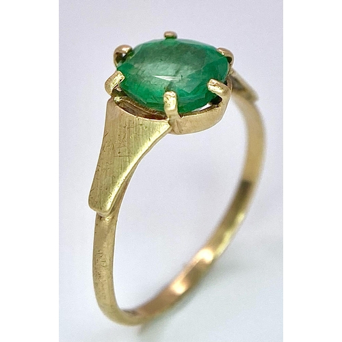 1390 - A Vintage 9K Yellow Gold Oval Emerald Ring. Size J. 1.1g total weight.