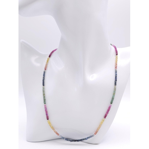 1676 - A 46ctw Ruby, Emerald and Sapphire Small Bead Necklace. 
42cm length. Ref: 1132