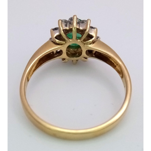 1685 - AN 18K GOLD RING WITH A 1ct EMERALD CENTRE STONE SURROUNDED BY BRIGHT DIAMONDS .   3.4gms   size O