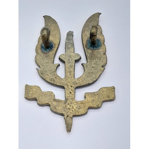 896 - WW2 Theatre Made S.A.S Cap Badge. A typical Middle Eastern sand cast badge of the period.