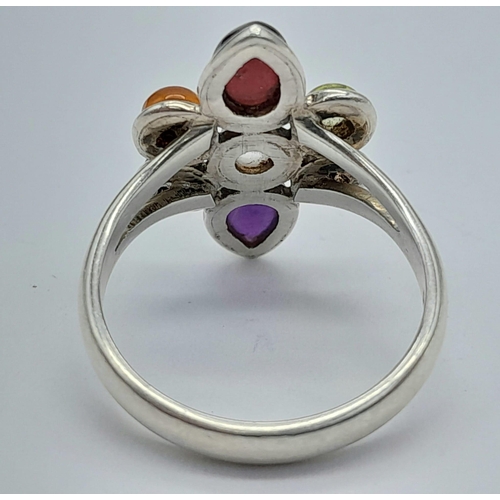 1231 - A STERLING SILVER MULTI STONE SET RING, IN THE FLORAL DESIGN 4.2G SIZE P

ref: SC 3120