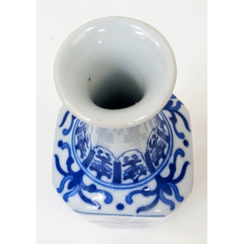 1233 - A Chinese Blue and White Single Stem Vase. Markings on base. Floral decoration throughout. 18cm tall