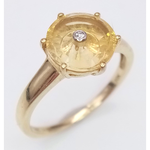 1237 - A DESIGNER CITRINE AND DIAMOND 10K GOLD RING .  2.7gms   size S