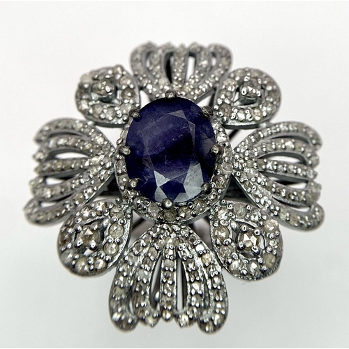 1272 - A 3.60ct Blue Sapphire Decorative Floral Cocktail Ring with 1.80ctw of  Diamond Accents. Size N. 10.... 