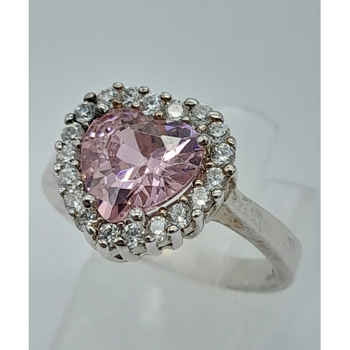 1303 - A STERLING SILVER PINK AND WHITE STONE SET IN THE HEART SHAPED CLUSTER RING 4G SIZE J 1/2

ref: SC 3... 