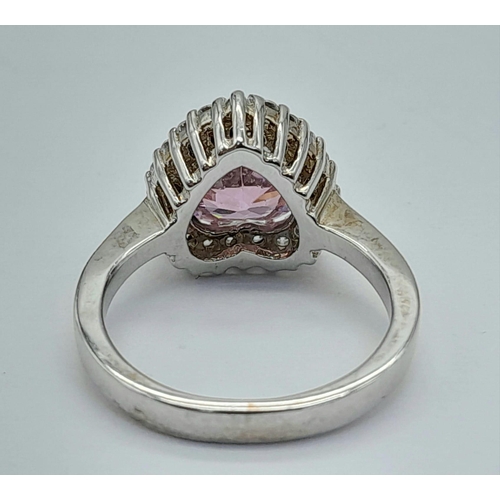 1303 - A STERLING SILVER PINK AND WHITE STONE SET IN THE HEART SHAPED CLUSTER RING 4G SIZE J 1/2

ref: SC 3... 