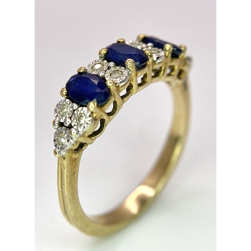 1311 - A Three Stone Sapphire and Diamond 9K Yellow Gold Ring. Size L. 2.53g total weight.