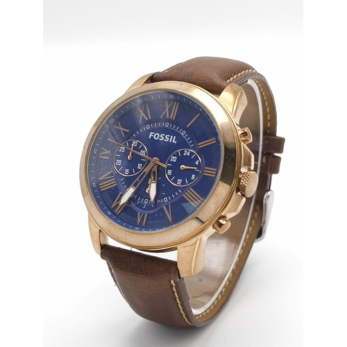 1330 - A Fossil Chronograph Quartz Gents Watch. Brown leather strap. Rose gold tone case - 46mm. Blue dial ... 