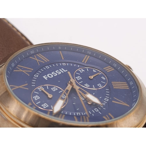 1330 - A Fossil Chronograph Quartz Gents Watch. Brown leather strap. Rose gold tone case - 46mm. Blue dial ... 