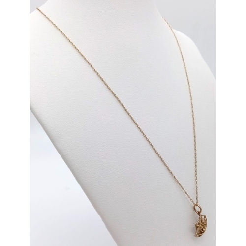 1337 - A fancy 9K yellow gold spider wed pendant on gold chain. Total weight 1.8G. Total length 46cm.