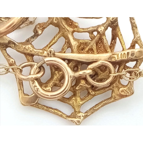 1337 - A fancy 9K yellow gold spider wed pendant on gold chain. Total weight 1.8G. Total length 46cm.