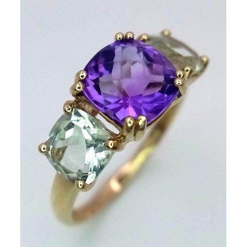 1340 - An Amethyst and Aquamarine 9K Yellow Gold Ring. Size P. 2.75g total weight.