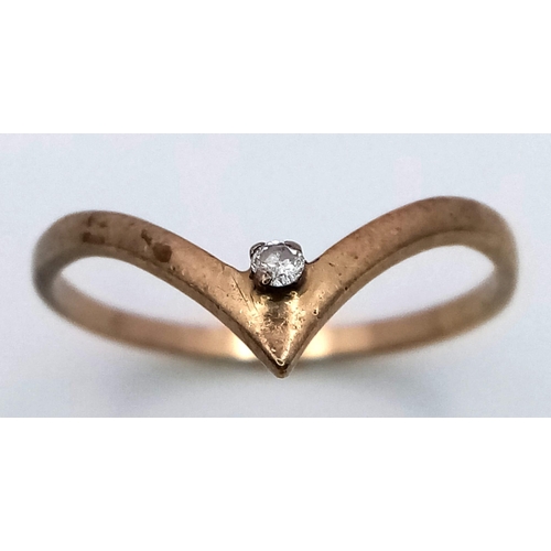 1349 - A 9K GOLD CHEVRON RING WITH ONE SMALL DIAMOND . 1.1gms   size O