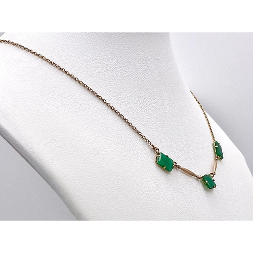 1350 - 3 EMERALD RECTANGLES ON A 9K GOLD NECKLACE  ,   2.5gms