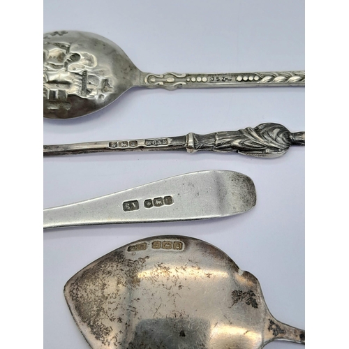 1495 - AN ASSORTMENT OF 7 ANTIQUE AND VINTAGE SILVER SPOONS .   89gms