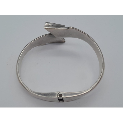 1502 - A VERY ATTRACTIVW SILVER HINGED BANGLE WITH BLACK ONYX ENDS  .   49gms