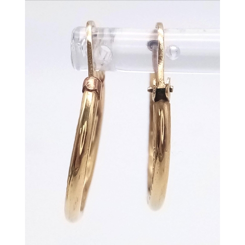 1513 - A Pair of 9K Yellow Gold Small Hoop Earrings. 0.77g weight.