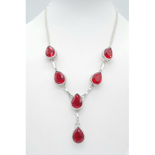 1546 - A Red Stone 925 Silver Necklace. 42cm