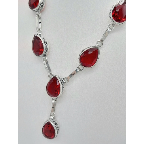 1546 - A Red Stone 925 Silver Necklace. 42cm