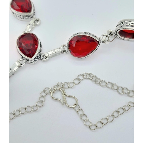 1546 - A Red Stone 925 Silver Necklace. 42cm