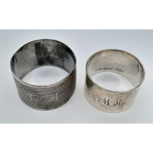 1573 - 2 HALLMARKED SILVER NAPKIN RINGS . 66.2gms