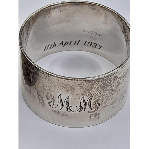 1573 - 2 HALLMARKED SILVER NAPKIN RINGS . 66.2gms