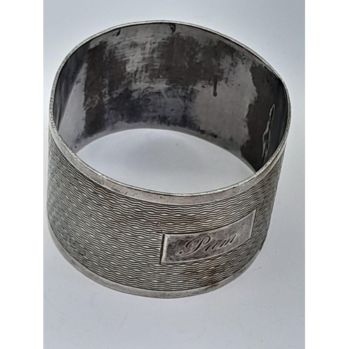 1573 - 2 HALLMARKED SILVER NAPKIN RINGS . 66.2gms