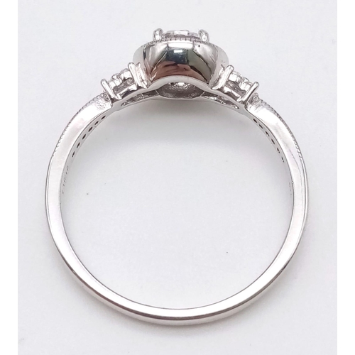 1640 - A 925 Silver Bright Zircon Ring. Size U.