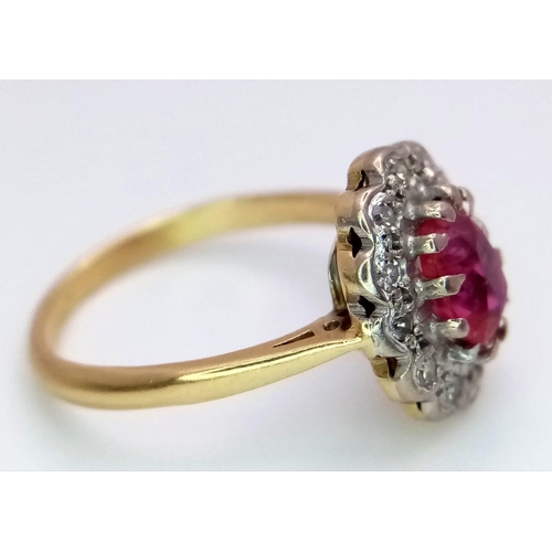 1650 - An 18K Yellow Gold, Burmese Ruby and Diamond Ring. 1ct central oval cut ruby with a diamond surround... 