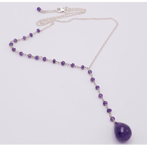 1683 - An Amethyst Necklace with Drop Earrings - Set in 925 Silver.
50cm length. 3cm drop. Ref: CD-1172