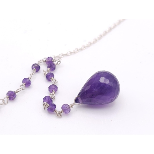 1683 - An Amethyst Necklace with Drop Earrings - Set in 925 Silver.
50cm length. 3cm drop. Ref: CD-1172