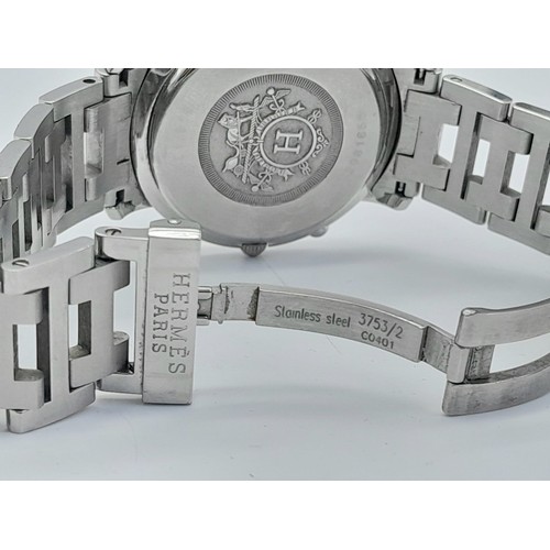 1342 - A HERMES STAINLESS STEEL CHRONOGRAPH WITH 3 SUBDIALS , QUARTZ MOVEMENT AND IN GOOD WORKING ORDER.  3... 