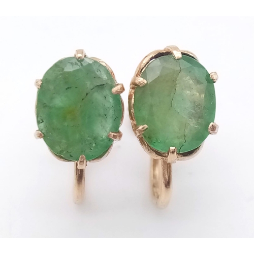 1260 - A PAIR OF NATURAL EMERALD EARRINGS IN 18K ROSE GOLD . 3.8gms