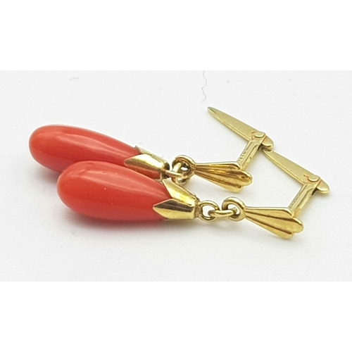 1267 - A PAIR OF NATURAL CORAL EARRINGS .  .75gms