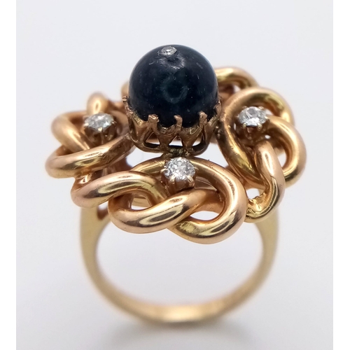 1343 - AN 18K GOLD SWIRL RING WITH DIAMONDS AND LARGE CIRCULAR SAPPHIRE .   10.3gms   size N/O