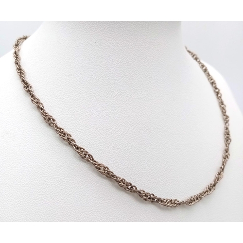 1587 - A 36cms SILVER  TWIST NECK CHAIN .  5.8gms