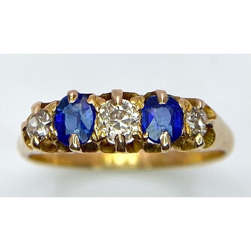 1203 - A VINTAGE 18K YELLOW GOLD  DIAMOND & SAPPHIRE 5 STONE RING. TOTAL WEIGHT 2.3G. SIZE N