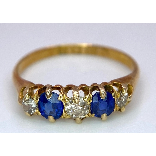 1203 - A VINTAGE 18K YELLOW GOLD  DIAMOND & SAPPHIRE 5 STONE RING. TOTAL WEIGHT 2.3G. SIZE N