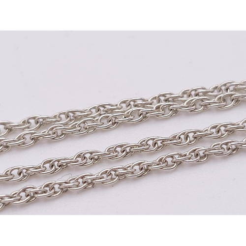 1221 - A 925 Silver Chain with Cross Pendant. 58cm and 2cm.