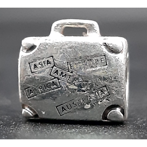 1295 - A PANDORA STERLING SILVER SUITCASE CHARM, ENGRAVING 